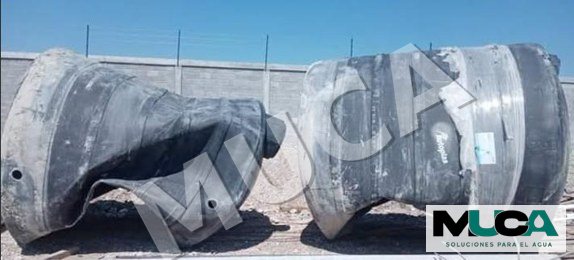 Tanques colapsados antes de la reparación